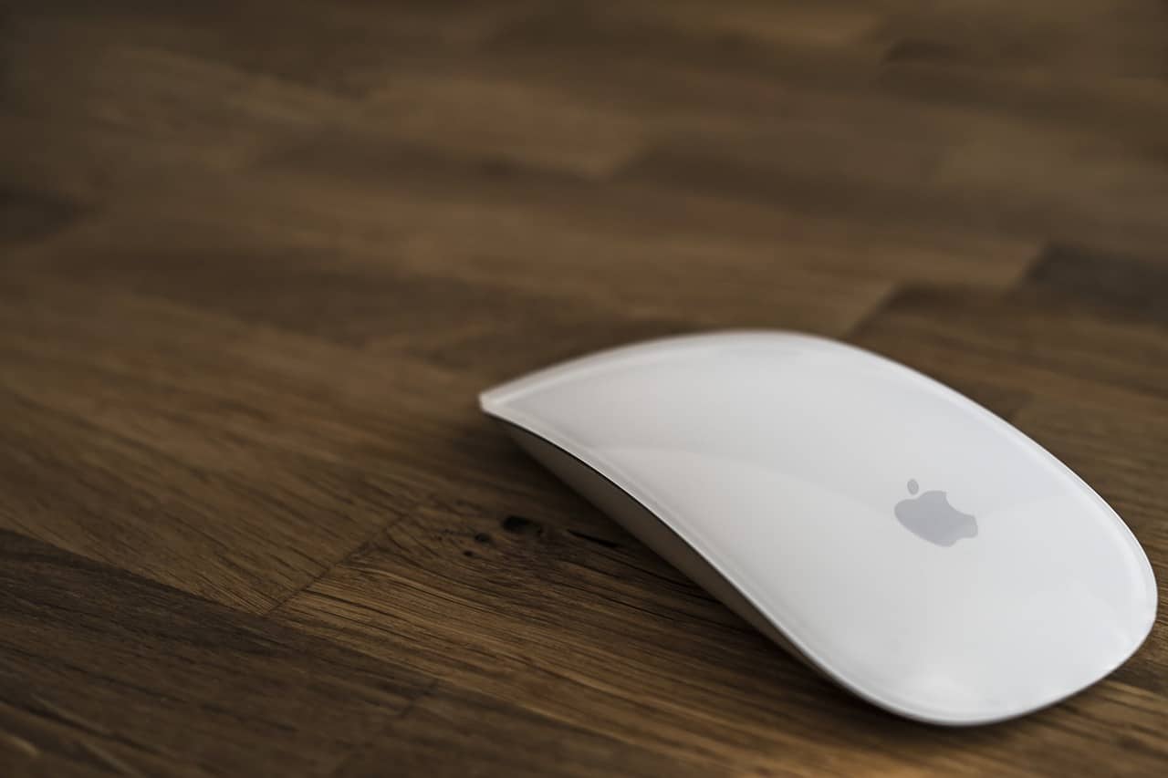 Photo of a computer mouse on a desk.